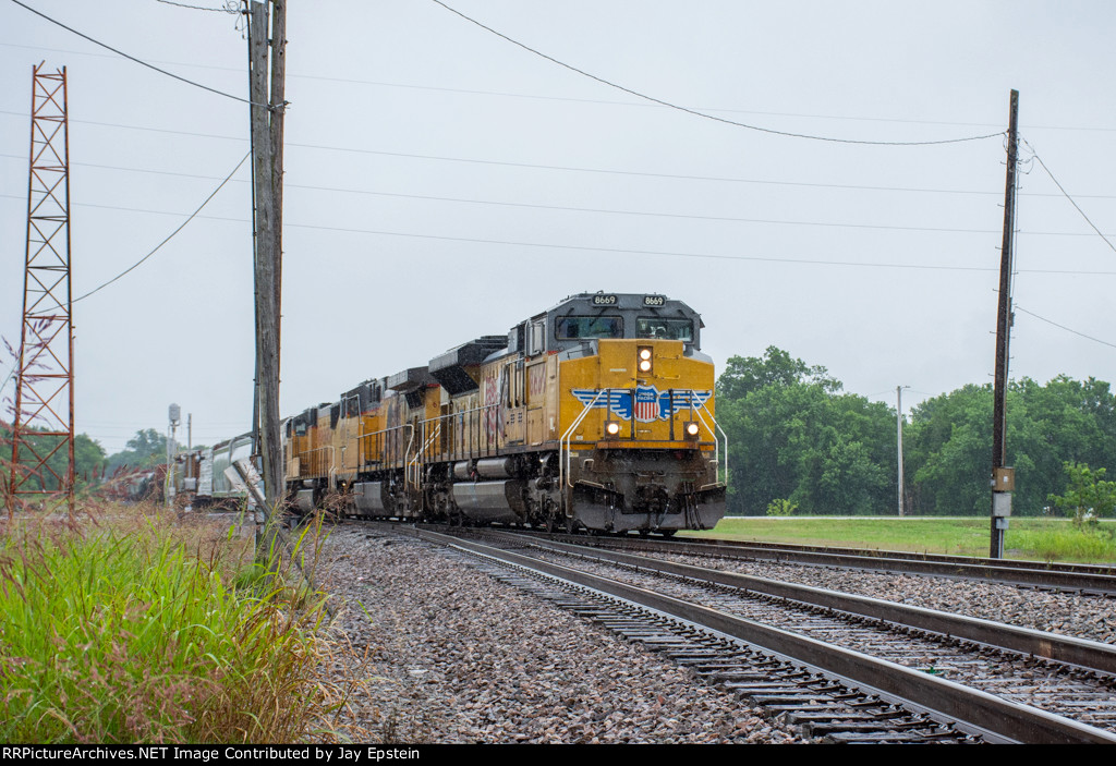 A westbound manifest rolls through Wagoner 